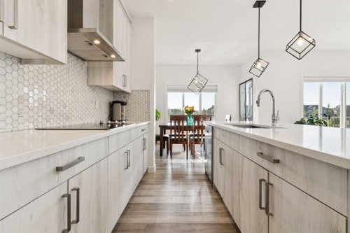 51 Midgrove Drive Sw, Airdrie, AB - Indoor Photo Showing Kitchen With Upgraded Kitchen
