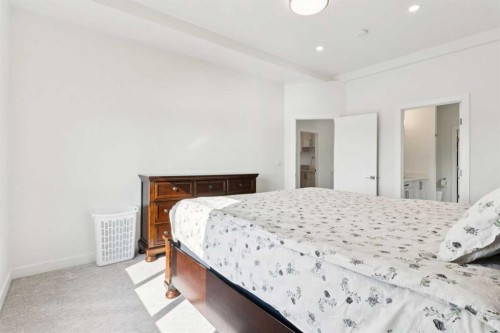 51 Midgrove Drive Sw, Airdrie, AB - Indoor Photo Showing Bedroom