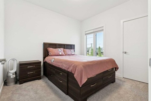 51 Midgrove Drive Sw, Airdrie, AB - Indoor Photo Showing Bedroom