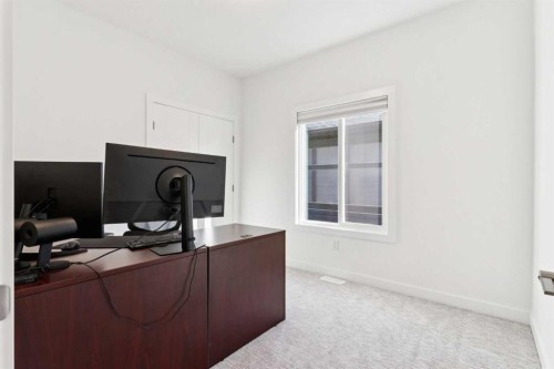 51 Midgrove Drive Sw, Airdrie, AB - Indoor Photo Showing Office