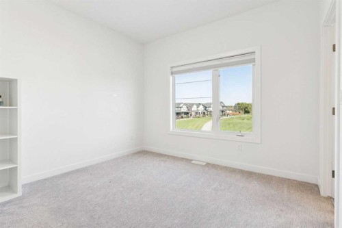 51 Midgrove Drive Sw, Airdrie, AB - Indoor Photo Showing Other Room
