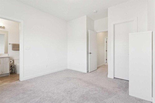 51 Midgrove Drive Sw, Airdrie, AB - Indoor Photo Showing Other Room