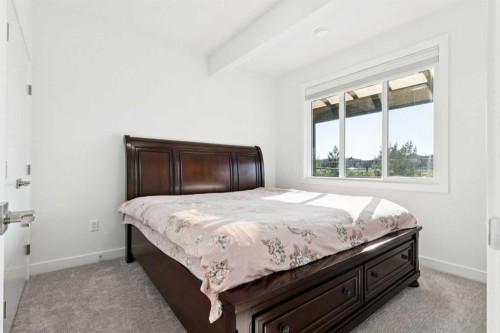 51 Midgrove Drive Sw, Airdrie, AB - Indoor Photo Showing Bedroom