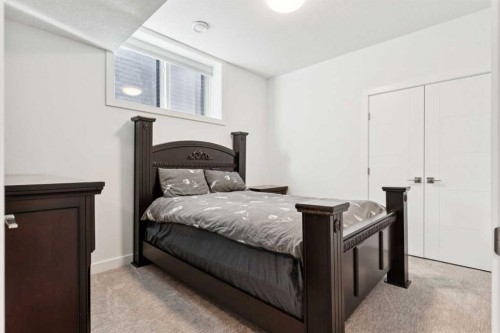 51 Midgrove Drive Sw, Airdrie, AB - Indoor Photo Showing Bedroom