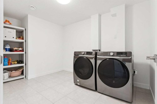 51 Midgrove Drive Sw, Airdrie, AB - Indoor Photo Showing Laundry Room