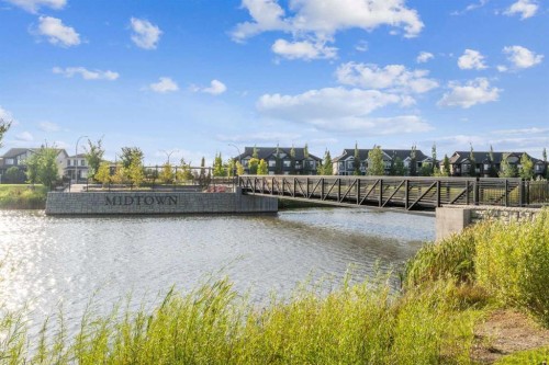 51 Midgrove Drive Sw, Airdrie, AB - Outdoor With Body Of Water With View