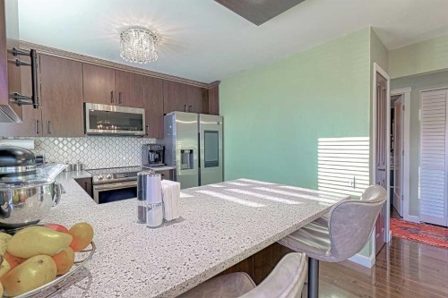 4728 Rundlehorn Drive Ne, Calgary, AB - Indoor Photo Showing Kitchen With Double Sink