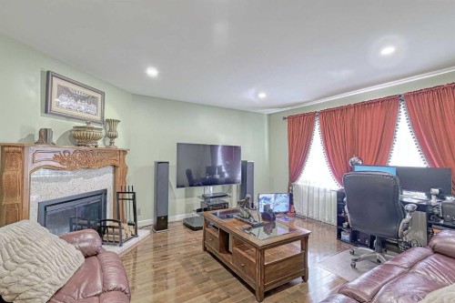 4728 Rundlehorn Drive Ne, Calgary, AB - Indoor With Fireplace