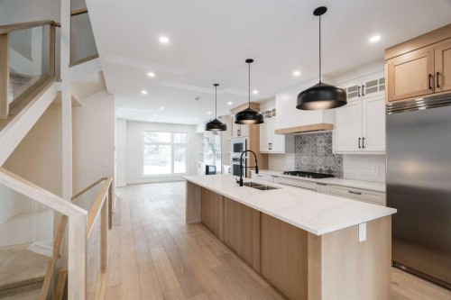 2812 35 Street Sw, Calgary, AB - Indoor Photo Showing Kitchen With Double Sink With Upgraded Kitchen