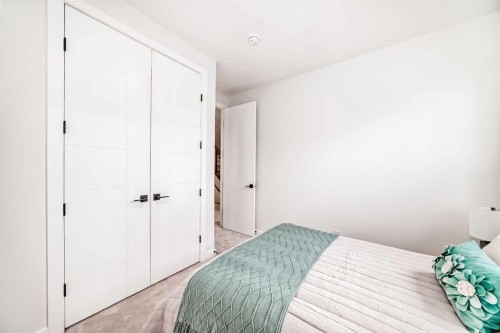 39B Moncton Road Ne, Calgary, AB - Indoor Photo Showing Bedroom