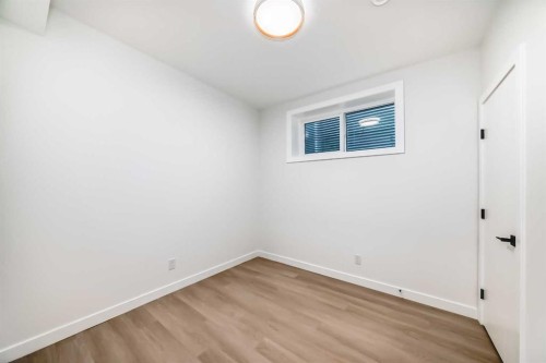 39B Moncton Road Ne, Calgary, AB - Indoor Photo Showing Other Room