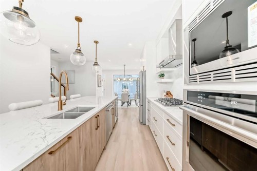 39B Moncton Road Ne, Calgary, AB - Indoor Photo Showing Kitchen With Double Sink With Upgraded Kitchen