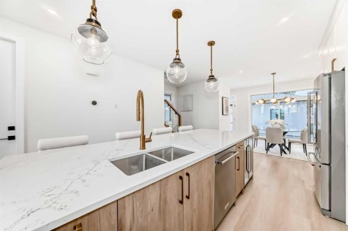 39B Moncton Road Ne, Calgary, AB - Indoor Photo Showing Kitchen With Double Sink With Upgraded Kitchen