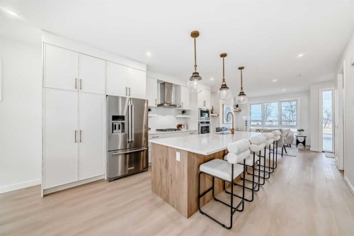 39B Moncton Road Ne, Calgary, AB - Indoor Photo Showing Kitchen With Upgraded Kitchen