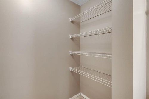 1109-505 Railway Street West, Cochrane, AB - Indoor With Storage