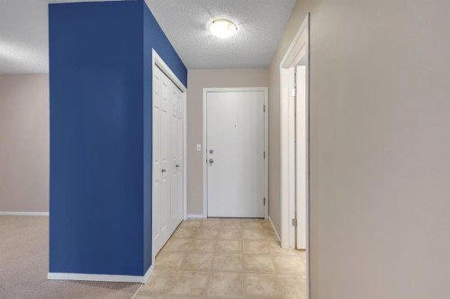 1109-505 Railway Street West, Cochrane, AB - Indoor Photo Showing Other Room