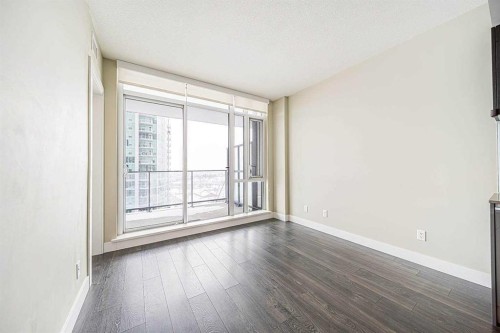 2203-1122 3 Street Se, Calgary, AB - Indoor Photo Showing Other Room With Fireplace