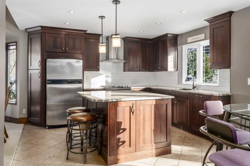 215 Edgemont Place Nw, Calgary, AB - Indoor Photo Showing Kitchen With Upgraded Kitchen