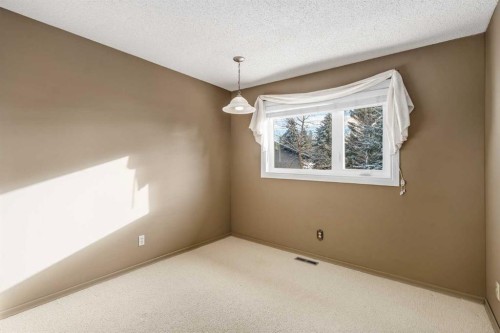 215 Edgemont Place Nw, Calgary, AB - Indoor Photo Showing Other Room