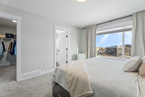 235 Chelsea Park, Chestermere, AB - Indoor Photo Showing Bedroom