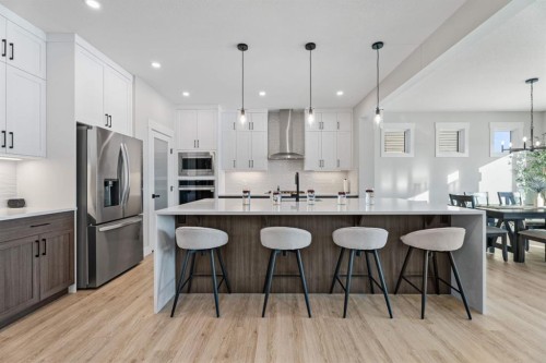 235 Chelsea Park, Chestermere, AB - Indoor Photo Showing Kitchen With Upgraded Kitchen