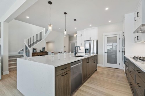 235 Chelsea Park, Chestermere, AB - Indoor Photo Showing Kitchen With Upgraded Kitchen