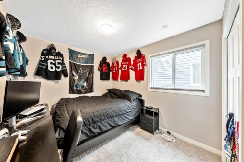 75 Fireside Crescent, Cochrane, AB - Indoor Photo Showing Bedroom