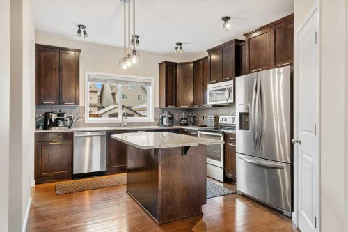 24 Copperpond Park Se, Calgary, AB - Indoor Photo Showing Kitchen With Stainless Steel Kitchen With Upgraded Kitchen