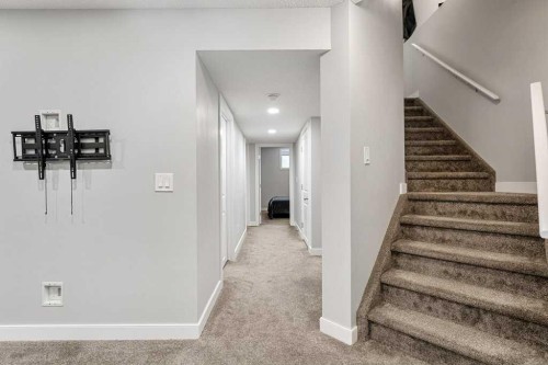 24 Copperpond Park Se, Calgary, AB - Indoor Photo Showing Other Room