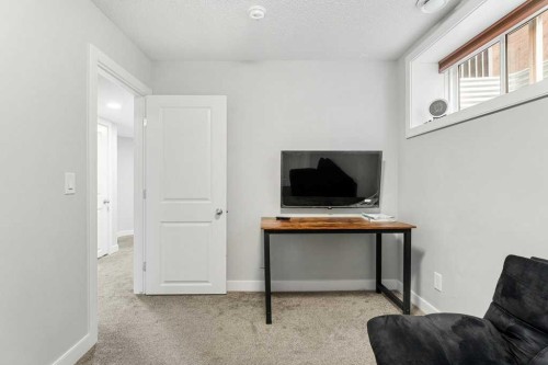 24 Copperpond Park Se, Calgary, AB - Indoor Photo Showing Other Room