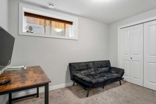 24 Copperpond Park Se, Calgary, AB - Indoor Photo Showing Other Room