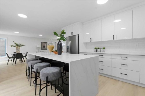 128 Deermoss Crescent Se, Calgary, AB - Indoor Photo Showing Kitchen With Upgraded Kitchen