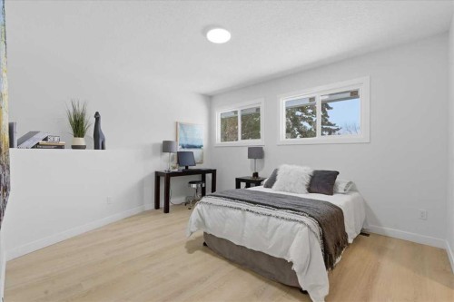 128 Deermoss Crescent Se, Calgary, AB - Indoor Photo Showing Bedroom