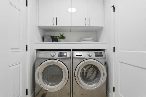 128 Deermoss Crescent Se, Calgary, AB - Indoor Photo Showing Laundry Room