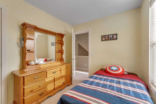 201-50 Belgian Lane, Cochrane, AB - Indoor Photo Showing Bedroom