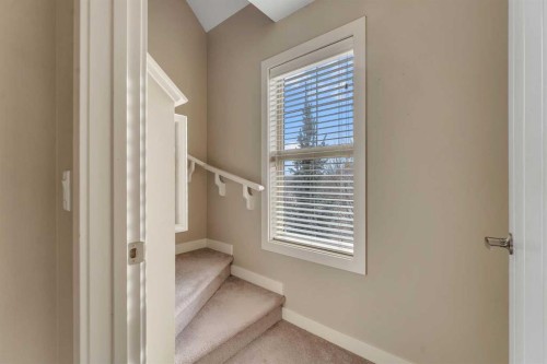 201-50 Belgian Lane, Cochrane, AB - Indoor Photo Showing Other Room