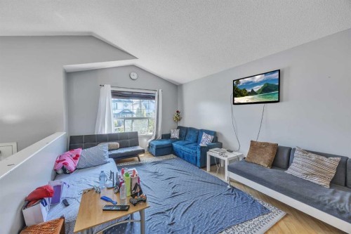 19 Saddlemont Way Ne, Calgary, AB - Indoor Photo Showing Living Room