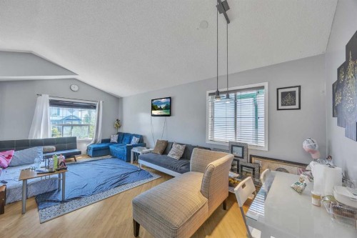 19 Saddlemont Way Ne, Calgary, AB - Indoor Photo Showing Living Room