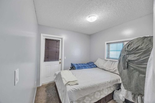 19 Saddlemont Way Ne, Calgary, AB - Indoor Photo Showing Bedroom