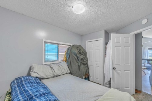 19 Saddlemont Way Ne, Calgary, AB - Indoor Photo Showing Bedroom