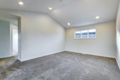 52 Magnolia Green Se, Calgary, AB - Indoor Photo Showing Other Room
