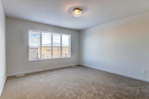 52 Magnolia Green Se, Calgary, AB - Indoor Photo Showing Other Room