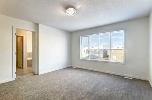 52 Magnolia Green Se, Calgary, AB - Indoor Photo Showing Other Room