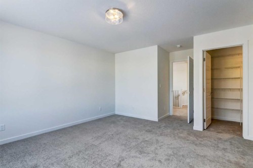 52 Magnolia Green Se, Calgary, AB - Indoor Photo Showing Other Room