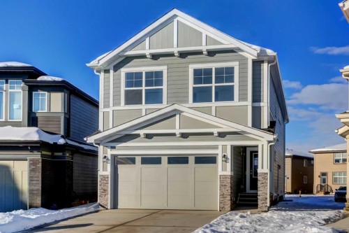 52 Magnolia Green Se, Calgary, AB - Outdoor With Facade