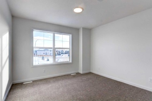 52 Magnolia Green Se, Calgary, AB - Indoor Photo Showing Other Room