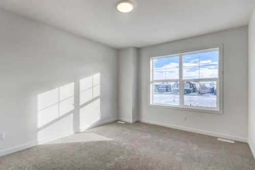 52 Magnolia Green Se, Calgary, AB - Indoor Photo Showing Other Room