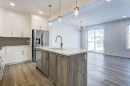 52 Magnolia Green Se, Calgary, AB  - Indoor Photo Showing Kitchen With Upgraded Kitchen 