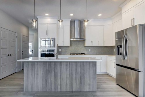 52 Magnolia Green Se, Calgary, AB - Indoor Photo Showing Kitchen With Stainless Steel Kitchen With Upgraded Kitchen