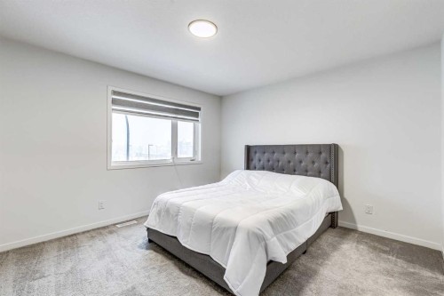 184 Rowmont Boulevard Nw, Calgary, AB - Indoor Photo Showing Bedroom